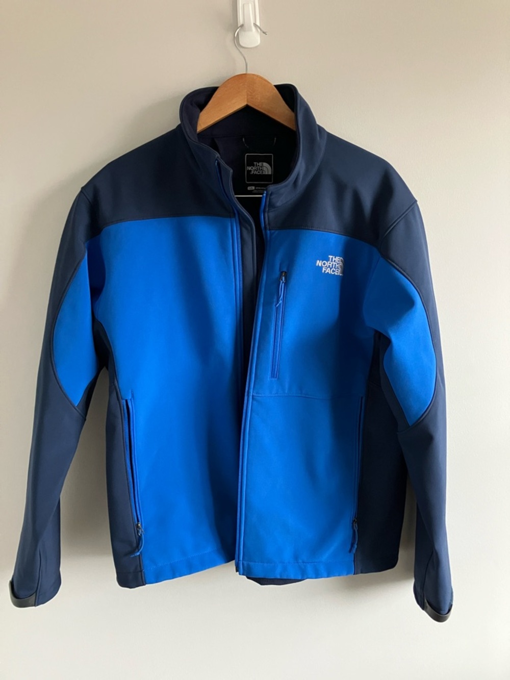 The North Face Men’s blue softshell jacket size large
